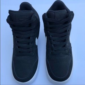 NIKE high top sneakers. Size 6 women. Worn four times.
